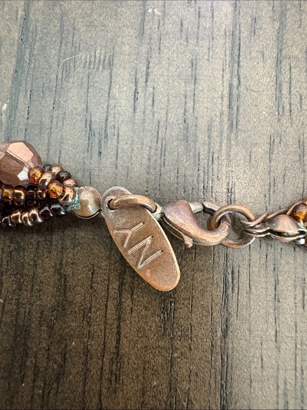 Multi-Strand Brown and Gold Beaded Necklace with Circular Pendant